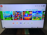 Console SWITCH V1 Mario Odyssey + 12 Jeux ( Zelda + Luigi 3 , Pokemon .. )